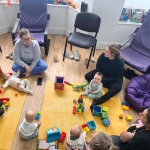 group of parents enjoying a north devon community meet