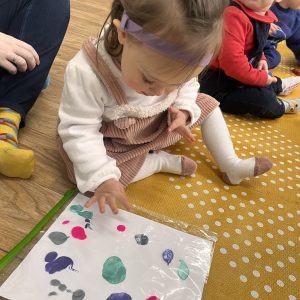 Child enjoying non messy painting at a north devon community meet