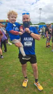 Julian with his son harrison wearing snug t shirts 